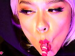 what’s behind her sweet lollipop suck?