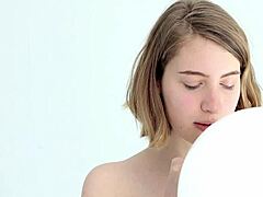 Skinny blonde teen bursts balloon