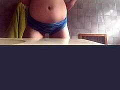 blonde chica films in bathroom