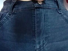 playing with a belt for pussy spanking