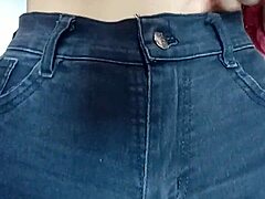 playing with a belt for pussy spanking