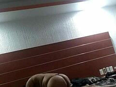Mature maduras in hotel room