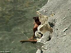 Beach Couple's Bold Intimacy