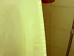 big tits babe soaps up in steamy shower