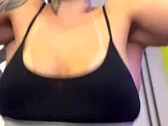 Tanned amateurs show off big natural tits in public gym