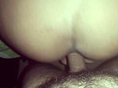 A man pleasuring himself with a glass dildo while his girlfriend watches