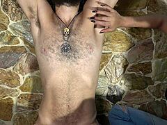 latina plays with hairy chest and armpits