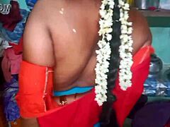 This desi housewife beauty changes her sari at home. Her charm just fills the room with allure!