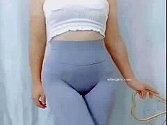 Hey, watch this Asian girl groove with a sexy cameltoe on display.