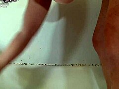 Liza gets cumshot and golden shower in wild tub scene.