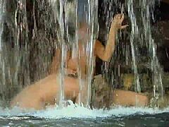 Blonde lesbians engage in poolside babe fucking