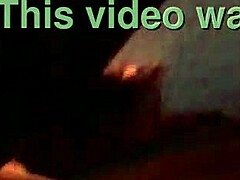 sexy tattooed curvy woman with piercings moaning softly in a relaxed setting