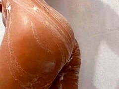 Cute skinny girl takes a bath.