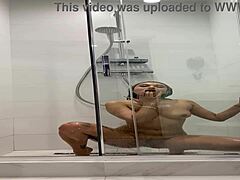 Naked Roxy rubs herself in steamy shower session