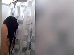 cute latina teen showering with wet body and sensual tattoo in steamy bathroom