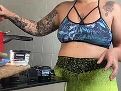Casada films cooking online but just wants to flash her swollen pussy.