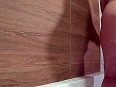 Bathroom camera catches mature wife with plump figure showering her curvy body. Watch this homemade pawg get wet!
