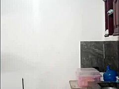 Cute Woman Cooking Naked In Her Kitchen With A Playful Vibe
