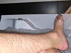 Watch me jerk off in the hot tub with relaxing music and foam all over my cock!