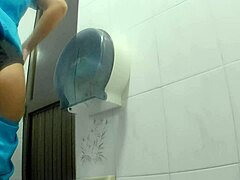 Wow, athletic latina peeing in public bathroom! Big ass alert!