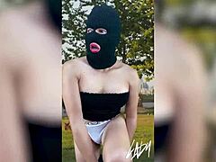 Horny shemale gets off masturbating with big tits and ass in public park crossdressing show