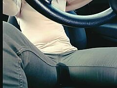 Woman in jeans desperately needs toilet but gets stuck in traffic and wets herself uncontrollably
