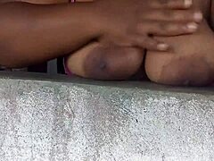 Curvy Woman Displays Her Large Natural Breasts At The Window For Passersby On The Street