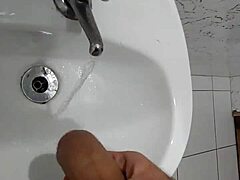 In a surprising display of raw power, the muscular bodybuilder reveals his huge soft cock while urinating outdoors. Curiosity peaks as viewers witness this intimate moment.