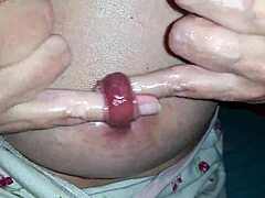 Nippleringlover as a kinky milf fingers her extreme stretched nipple piercings with two fingers through