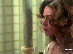 Corinne Clery and Jehanne Blaise appear in a 1975 scene with topless moments and sensual handjob interactions