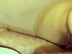 Arab woman expresses passion during intimate bedroom encounter