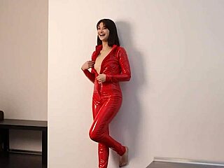 Red latex grips young shaved pussy in fierce action