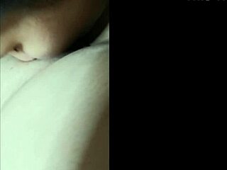 licking her tits and shaved pussy