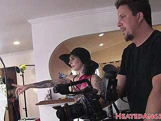 Redhead alt babe flaunts tattoos backstage
