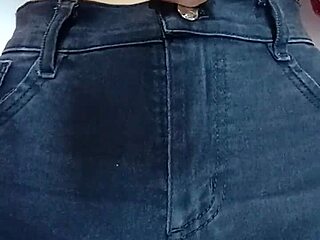 playing with a belt for pussy spanking