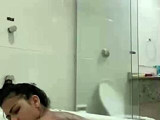 bia morena masturbates with bathtub jet