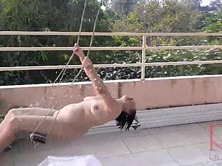 HOUSEWIFE STRIPS IN WILD RAIN