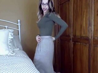 my milf in glasses strips for a handjob