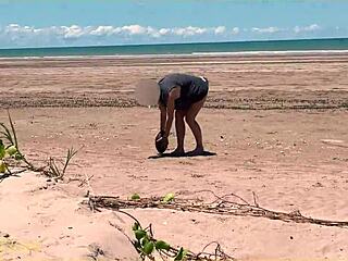 wife flaunts curves at public shore.