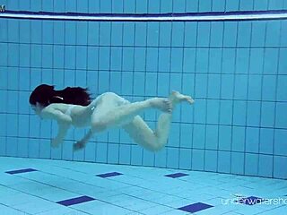 roxalana cheh teases underwater with redhead charm