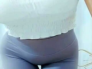Hey, watch this Asian girl groove with a sexy cameltoe on display.