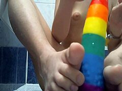 xannie enjoys shower play with dildo