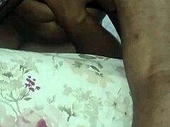 Latina girl enjoys homemade fun with dripping action.