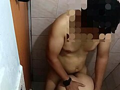 asian couple enjoys intimate moment in bathroom