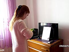 Beautiful naked redhead karolinka applies makeup while posing