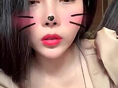 Asian girl shows off big tits in sexy live session