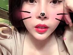 Asian girl shows off big tits in sexy live session