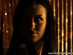 bolly babe dances seductively, stripping off clothes to reveal her gorgeous brunette curves in an exotic tease