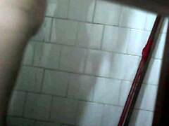 Hidden camera captures a steamy voyeur view of my aunt's private bath moment in full detail