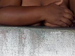 Curvy Woman Displays Her Large Natural Breasts At The Window For Passersby On The Street